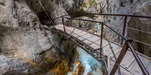 Start a mountain hike at Garmisch station, then climb the spectacular path to the Alpine lodge of Höllentalangerhütte